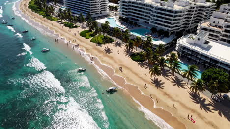 tropical beach resort with tourists