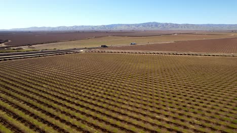 san joaquin river valley with almond fields below near modesto, california