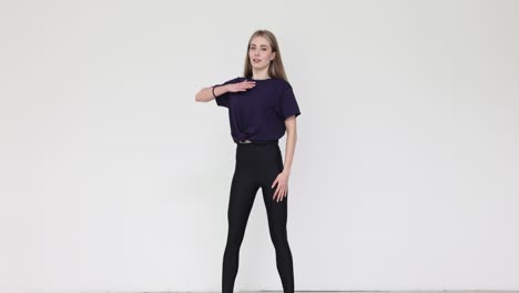 young woman in athletic wear against white background