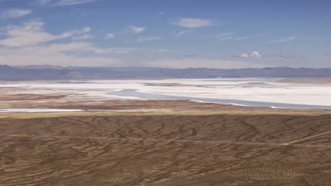 aerial drone tracking orbit overlooking the salinas grandes of jujuy and salta provinces, argentina