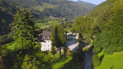 aerial across bukovje manor with green gardens in dravograd, slovenia