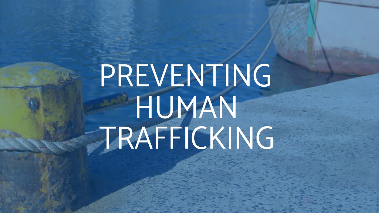 Animation of human trafficking awareness text over boat