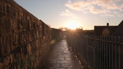 slow push in through medieval city walls of york built back in roman times for protection for enemies