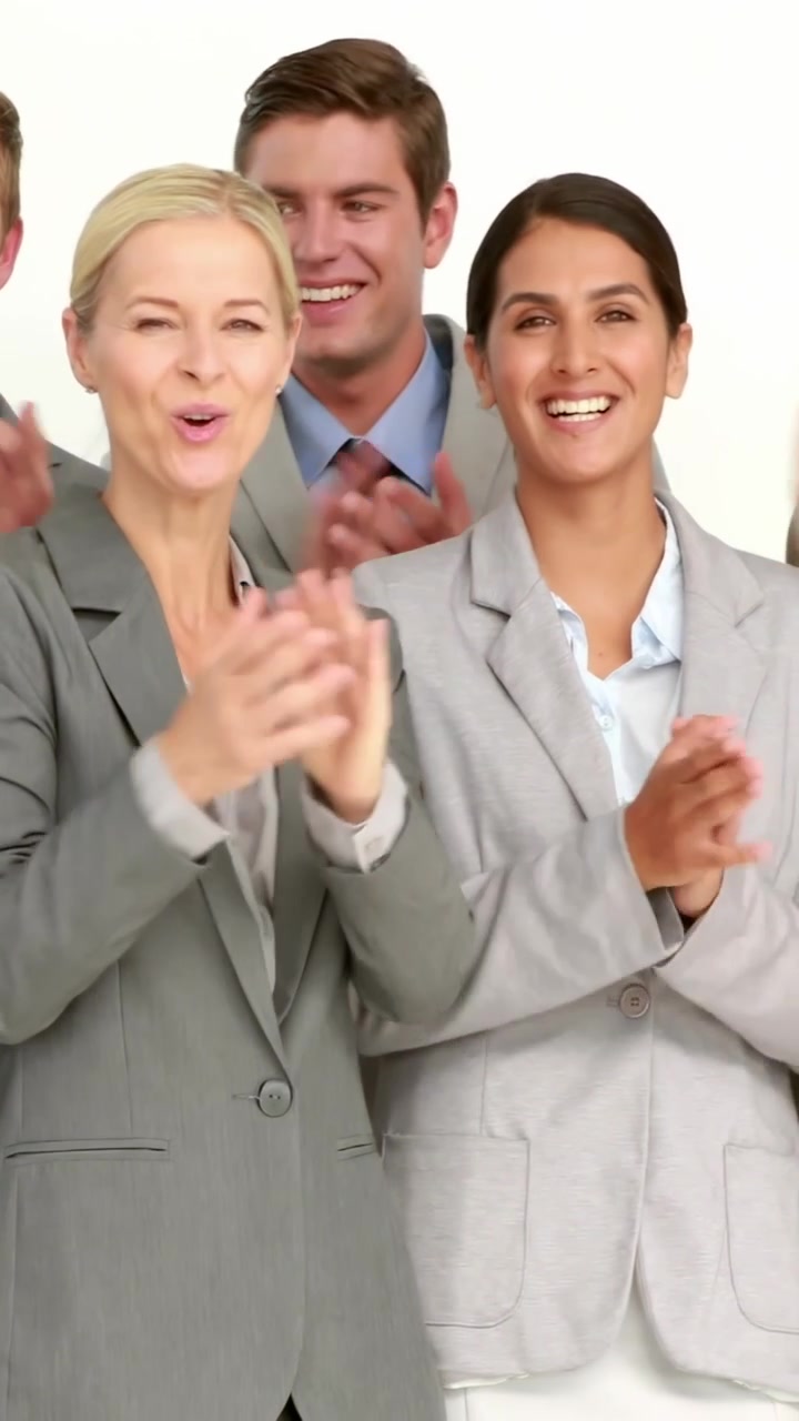 Vertical video: Business team celebrating while overlay sliding in over hands showing phone icons