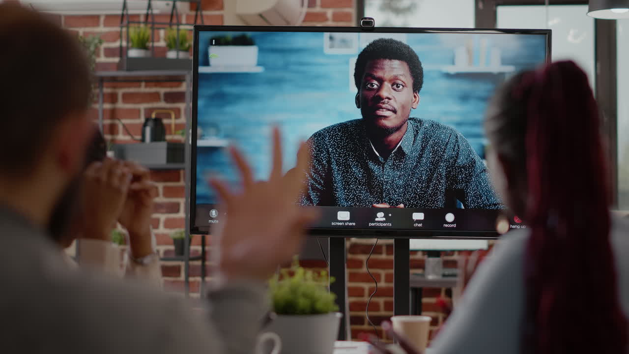 Close up of multi ethnic team talking on remote video call