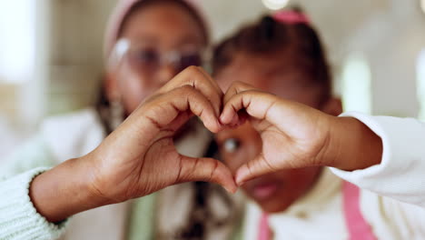 Heart-hands,-closeup-and-mother