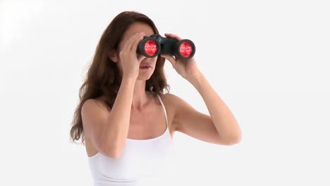Assertive-hispanic-woman-looking-through-binoculars