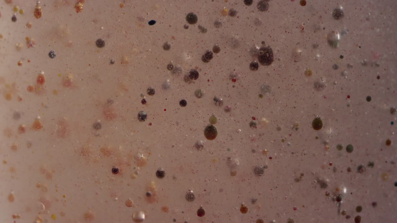 Macro gross bubbling swamp liquid motion texture background