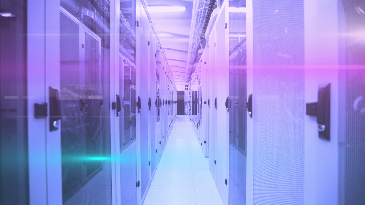 Computer servers in a server room with glowing lights