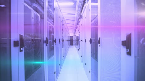 computer servers in a server room with glowing lights