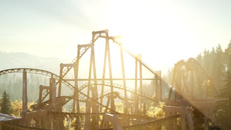 old roller coaster at sunset