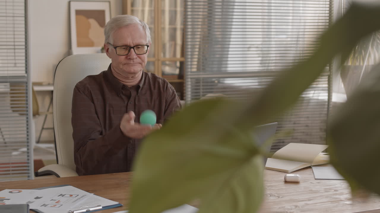 Man in office presenting with technology