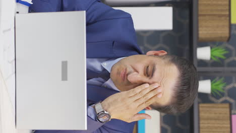 vertical video of businessman looking at his wrinkled and rough skin.