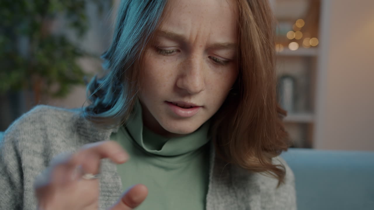 Close-up of a concerned teenage girl