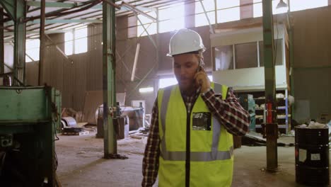 male worker talking on mobile phone 4k