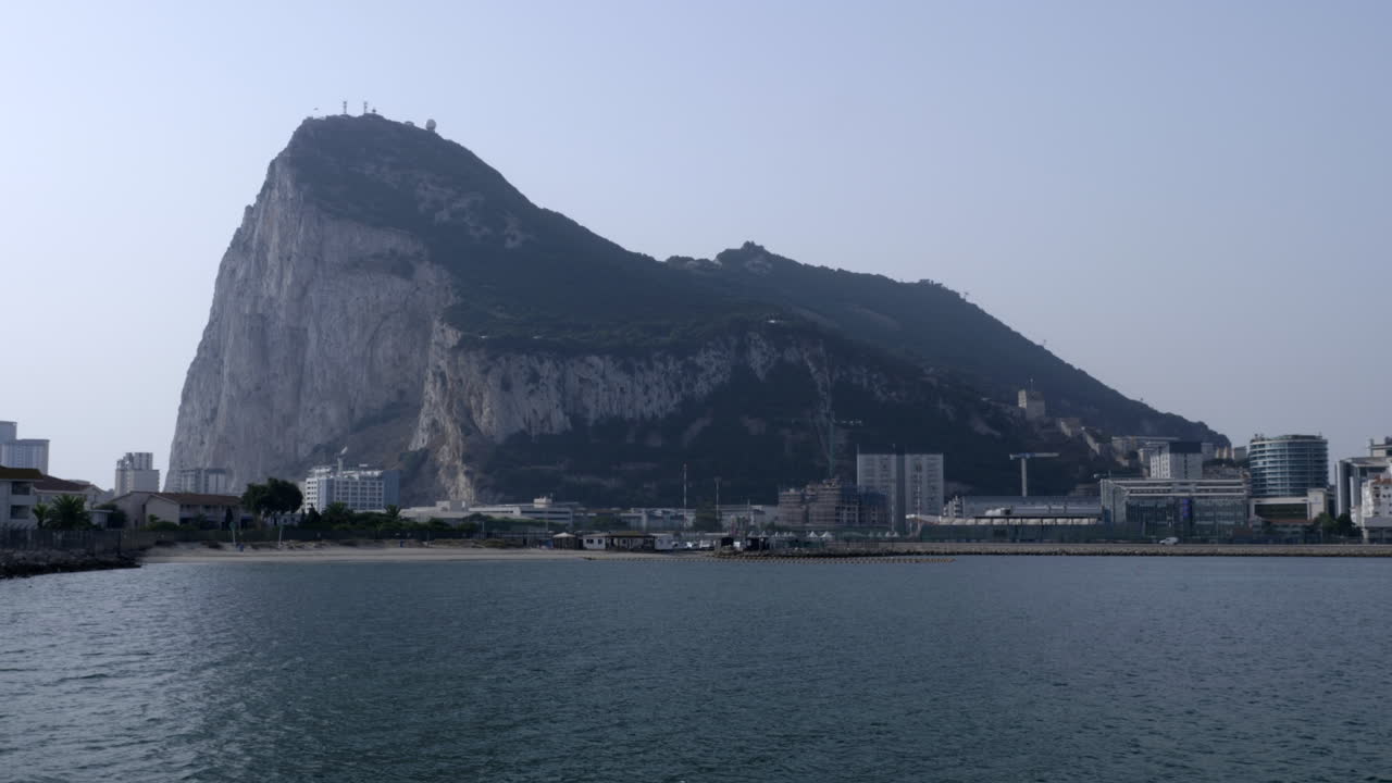 Gibraltar at sunset, with its airstrip and part of the skyline, as seen from La Linea de la Concepcion in Spain