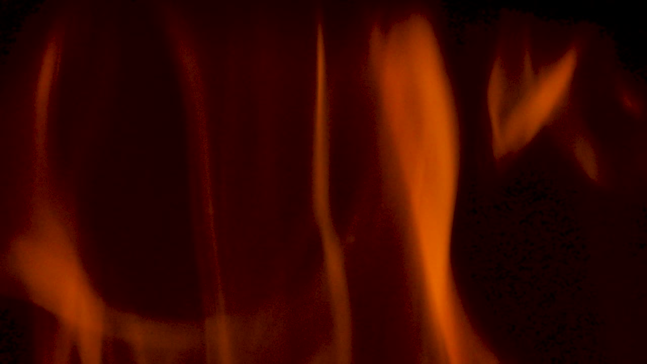 Slow Motion Footage of Hot Orange Fire Flames Isolated on Black Background for Easy Compositing