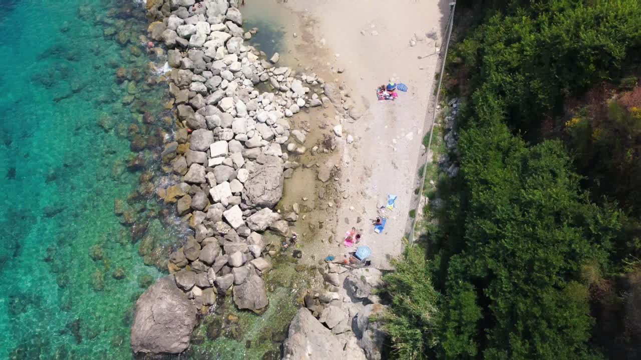 Overhead aerial view of Capri coastline from a drone, Italy in summer season