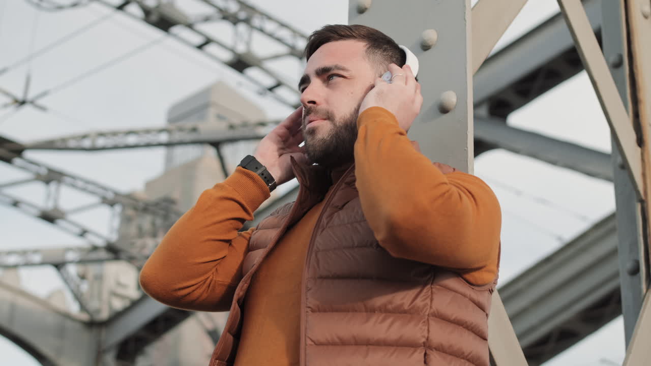 Man Listening to Music in Headphones