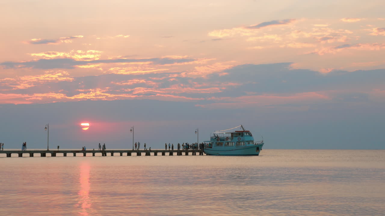 People Boarding the Boat from Sea Pier