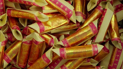 burning joss or incense paper during cheng beng or qingming, a chinese festival, to honor ancestors