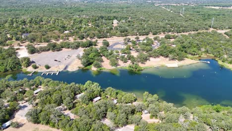 Moving-to-the-left-high-above-an-inlet-for-a-park-on-a-lake