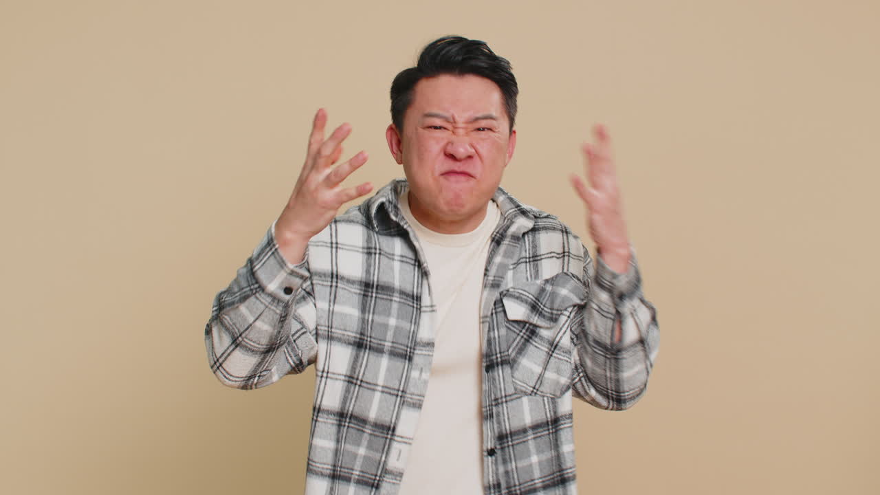 Man having quarrel irritation displeasure blaming scolding for failure asking why this happened