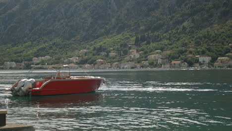 red boat in a beautiful coastal bay