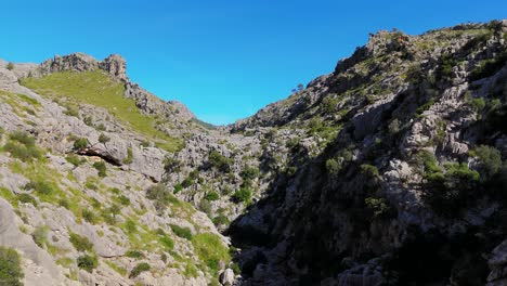 High-Green-Mountains-Next-To-Sea,-Aerial-Drone-Footage,-Mallorca-