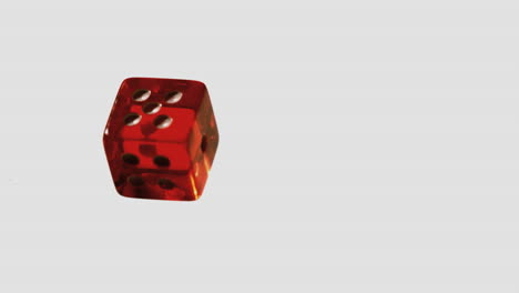 red dice falling and bouncing