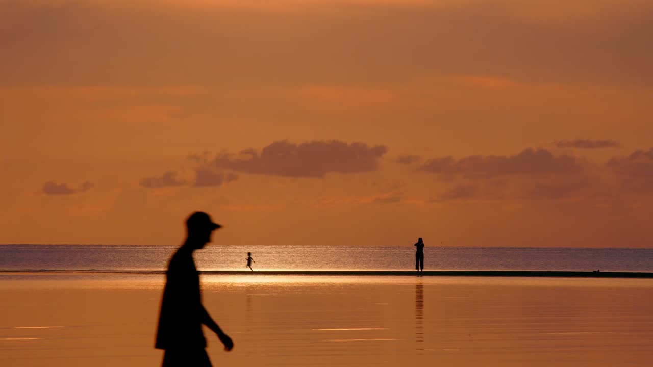 Sunset Beach Walk with Mother and Child