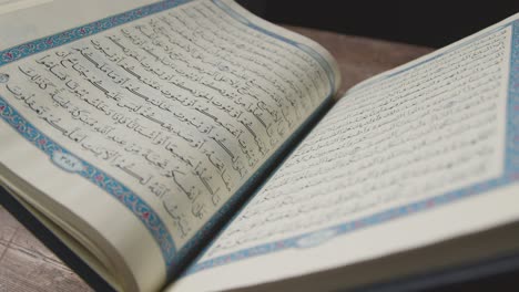 A-Handheld-Shot-of-the-Quran-Religious-Text-Pages