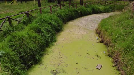 drone shot of the dirty river in ecuador