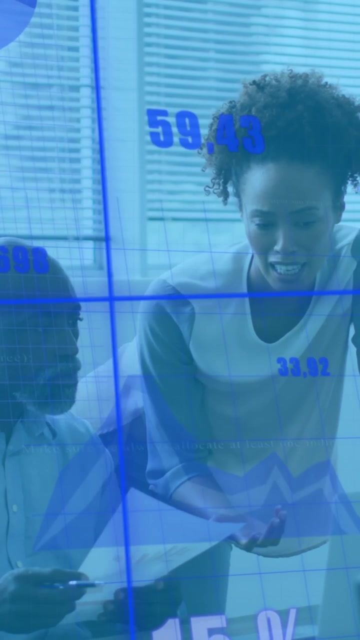 Animation of graphs and changing numbers over diverse coworkers discussing reports on desk