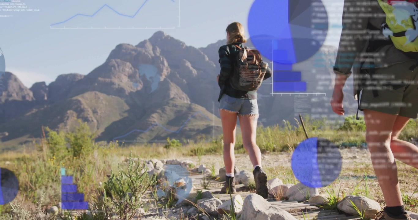 Woman stepping on plank activating floating tech graphics analyzing trail data with man joining