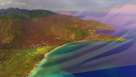 digital composition of waving germany flag against aerial view of the sea