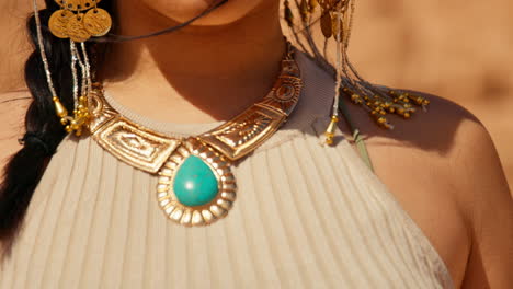 Closeup-of-a-Woman-Wearing-Golden-Jewelry