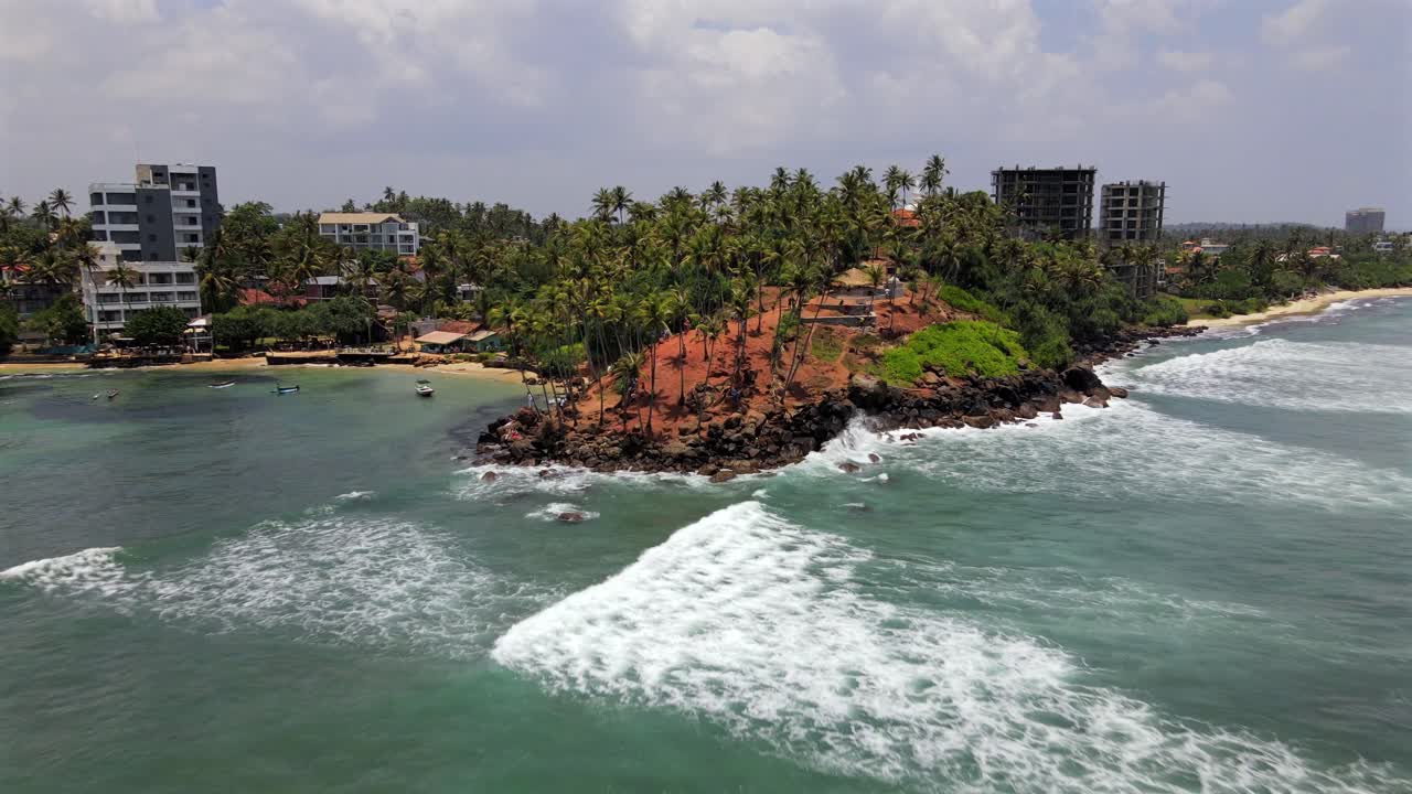 Aerial establisher holiday resort Mirissa in Sri Lanka, coastline panorama
