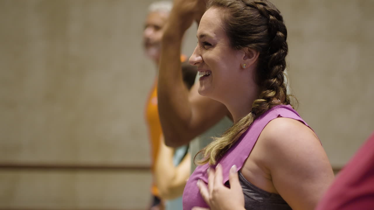 Group exercise class with smiling people