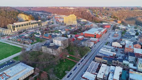 blue hour aerial drone shot of downtown frankfort in kentucky, flying upward