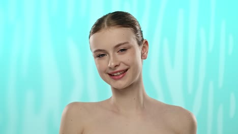 young woman with clear radiant face smiling gently for skincare a young woman with a clear complexion gently touches her face suggesting a skincare theme and youthful radiance