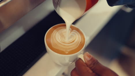 coffee, milk and hands of person in cafe