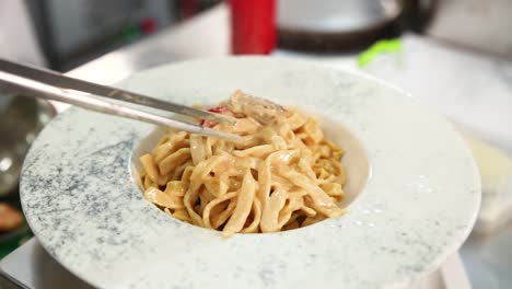 pasta dish being prepared or served