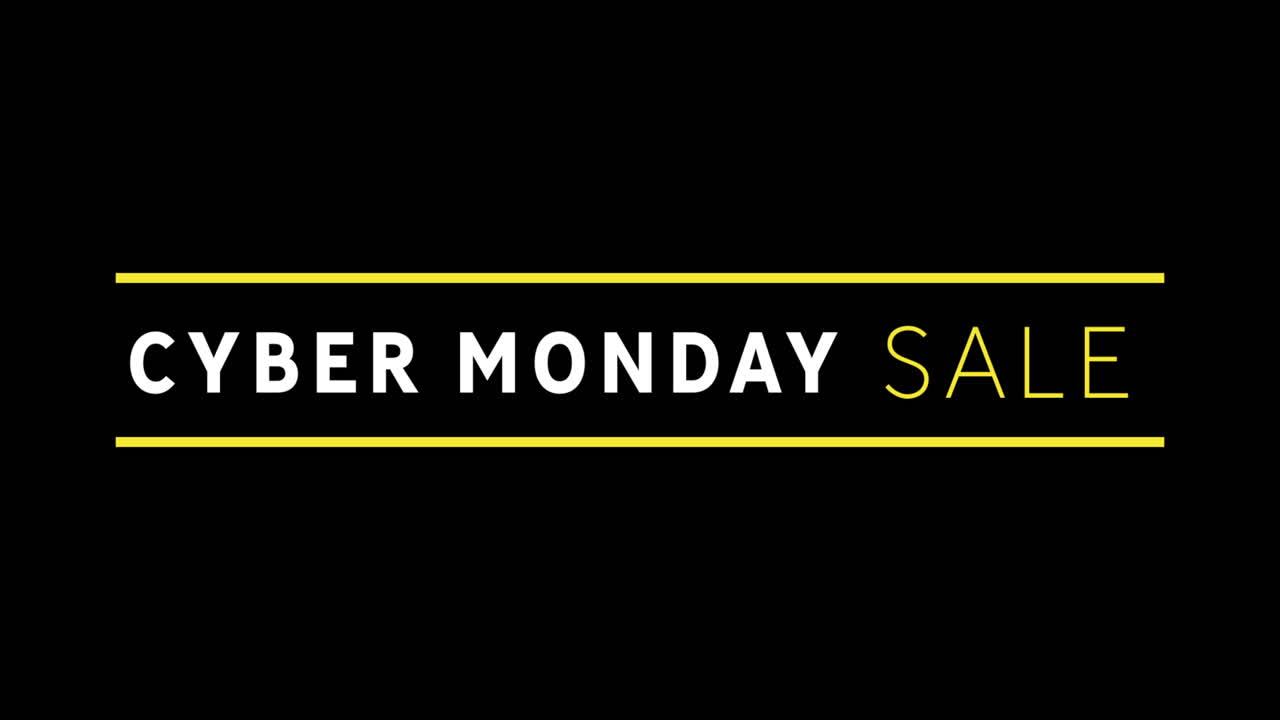 texto de venta blanco y amarillo de cyber monday que aparece contra una pantalla negra