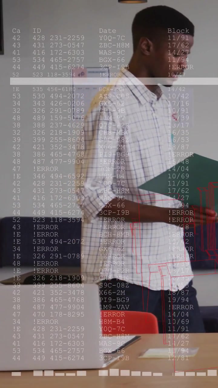 Vertical video: Man with green folder presenting tech project, error overlay rising, obscuring desk