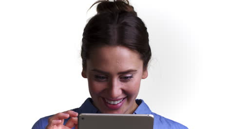 Shot-Of-Woman-Using-Digital-Tablet-Against-White-Background