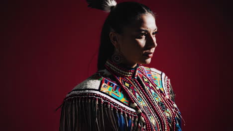 portrait of an indigenous woman in traditional regalia