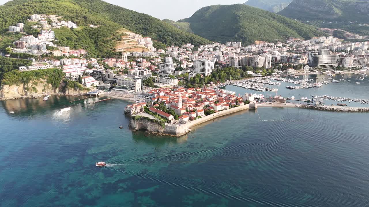 Aerial drone birds eye view budva Riviera old town city coastal montenegro balkan country balkans adriatic sea coastline Stari Grad sveti nikola island