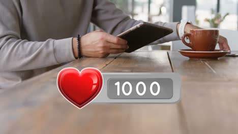 icono del corazón y un hombre usando dispositivos digitales