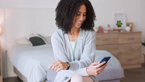 Happy-black-woman,-phone-and-relax-in-bedroom